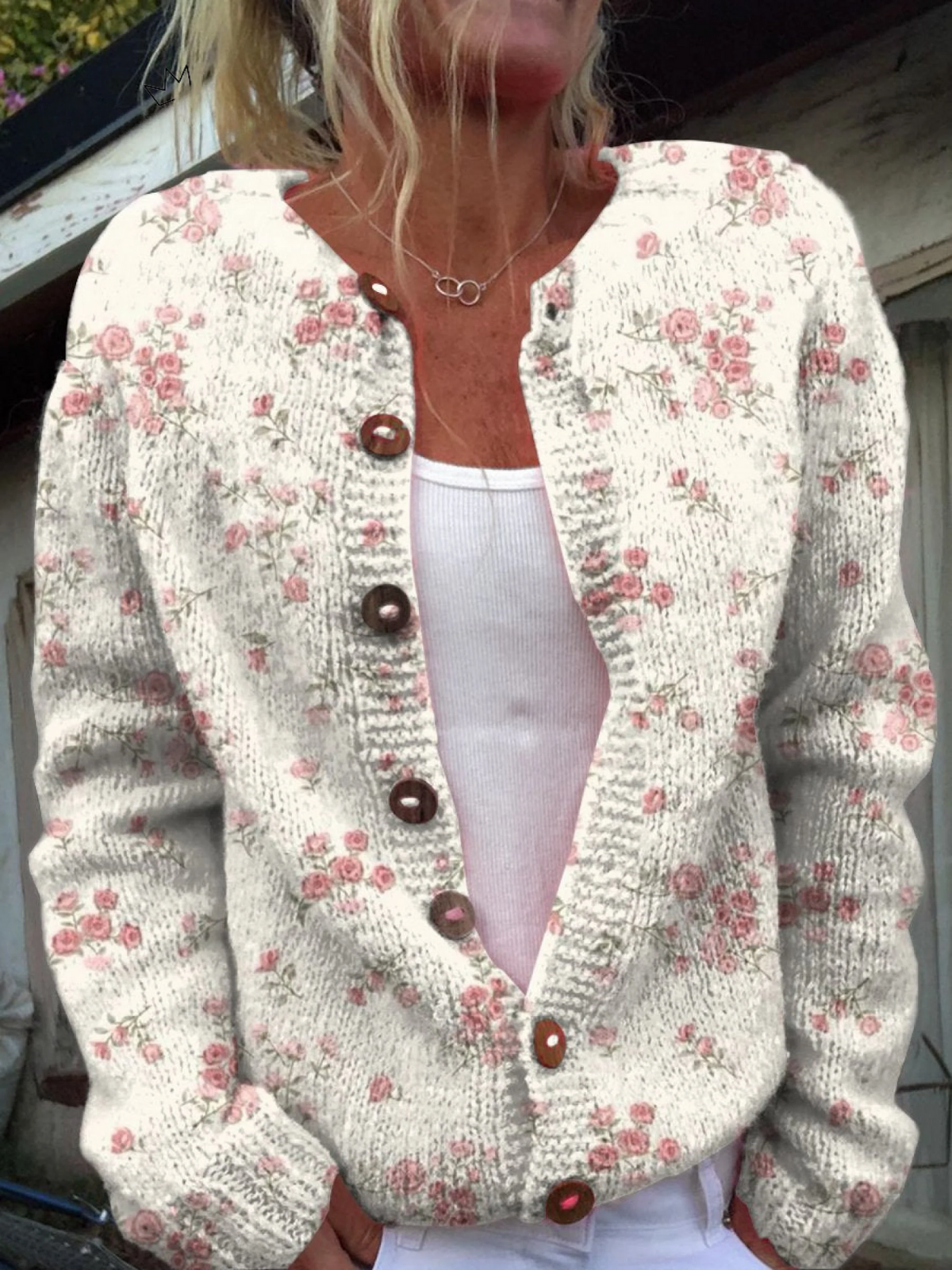 Cardigan de botones con estampado de pequeñas flores en tono rosa